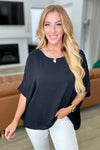 Feels Like Me Dolman Sleeve Top in Black - Maple Row Boutique 